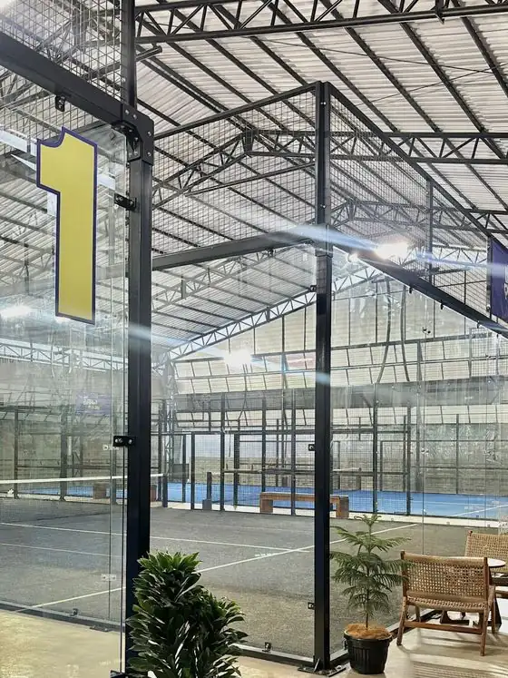 Court 1 at The Padel Side behind panoramic glass