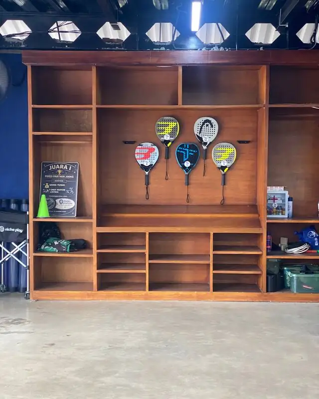 Wooden racket rental shelf